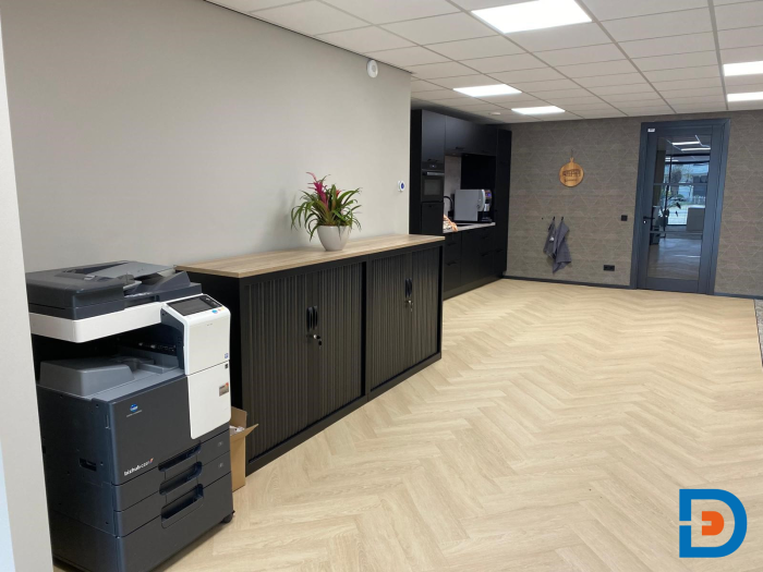 Functionele printer voorzien van praktische opbergruimte voor accessoires en papier